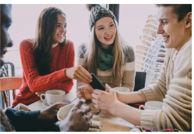 group of teens laughing 